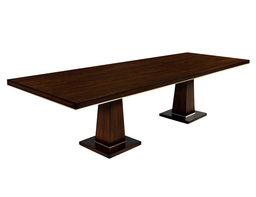 https://a.1stdibscdn.com/custom-walnut-dining-table-with-brass-details-for-sale-picture-2/f_8849/f_329189121677092745368/DS_5215_Carrocel_Custom_Walnut_Dining_Table_Brass_Details_002_master.jpg