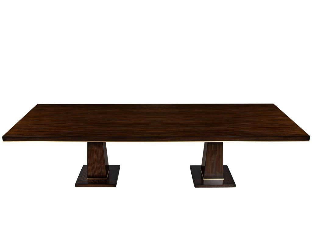 https://a.1stdibscdn.com/custom-walnut-dining-table-with-brass-details-for-sale-picture-3/f_8849/f_329189121677092745432/DS_5215_Carrocel_Custom_Walnut_Dining_Table_Brass_Details_003_master.jpg