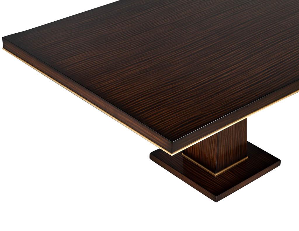 https://a.1stdibscdn.com/custom-walnut-dining-table-with-brass-details-for-sale-picture-4/f_8849/f_329189121677092745385/DS_5215_Carrocel_Custom_Walnut_Dining_Table_Brass_Details_004_master.jpg
