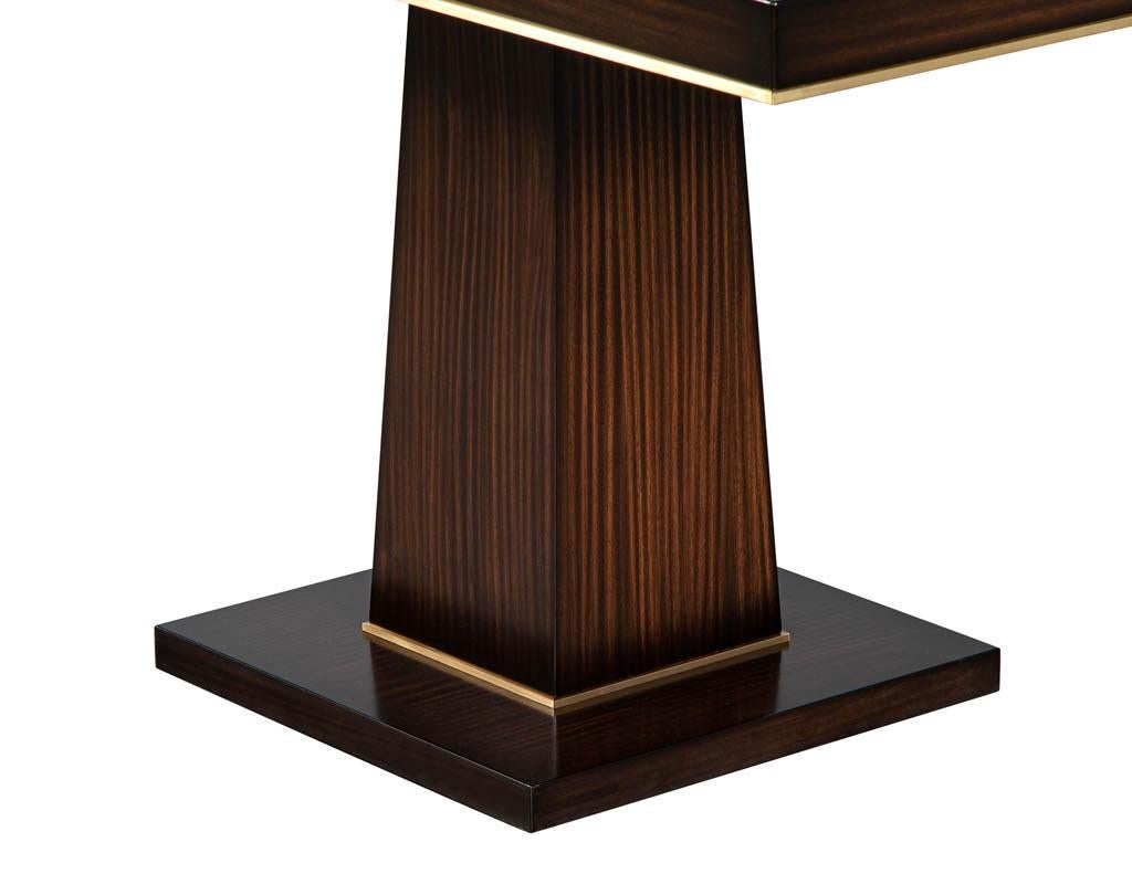 https://a.1stdibscdn.com/custom-walnut-dining-table-with-brass-details-for-sale-picture-6/f_8849/f_329189121677092745395/DS_5215_Carrocel_Custom_Walnut_Dining_Table_Brass_Details_006_master.jpg