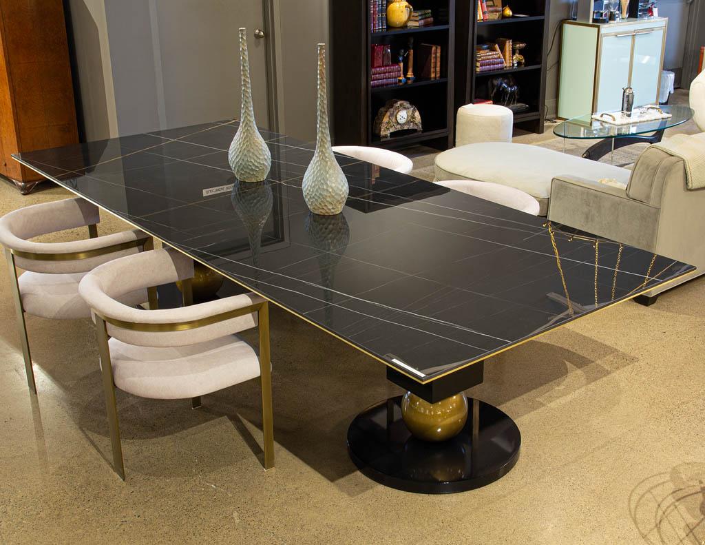 https://a.1stdibscdn.com/modern-porcelain-dining-table-with-brass-accents-for-sale-picture-15/f_8849/f_343129921684276535257/DS_5216_Modern_Porcelain_Dining_Table_Brass_0021_master.jpg