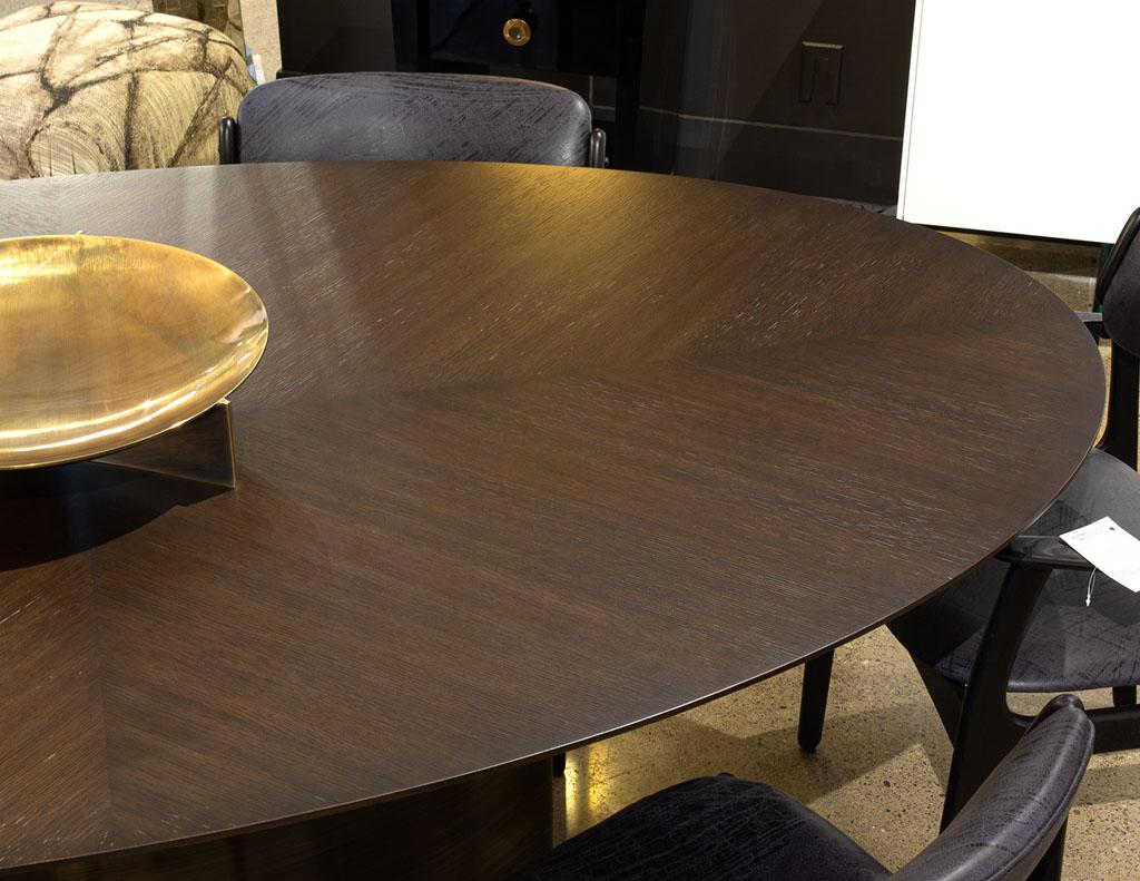 https://a.1stdibscdn.com/modern-oval-oak-dining-table-with-curved-metal-pedestals-for-sale-picture-15/f_8849/f_347313321686592222083/DS_5218_Modern_Oval_Oak_Dining_Table_Curved_Metal_Pedestals_0015_master.jpg