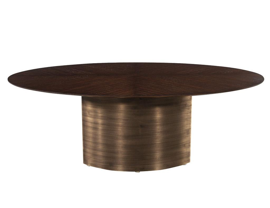 https://a.1stdibscdn.com/modern-oval-oak-dining-table-with-curved-metal-pedestals-for-sale-picture-2/f_8849/f_347313321686592221656/DS_5218_Modern_Oval_Oak_Dining_Table_Curved_Metal_Pedestals_002_master.jpg