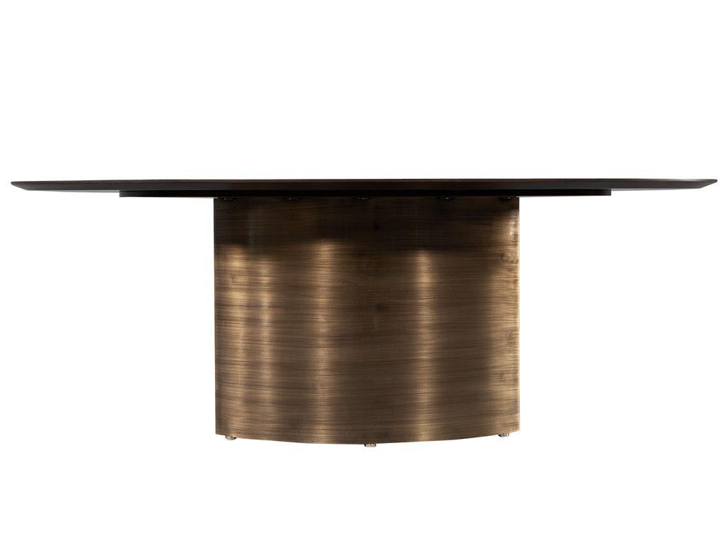 https://a.1stdibscdn.com/modern-oval-oak-dining-table-with-curved-metal-pedestals-for-sale-picture-3/f_8849/f_347313321686592221404/DS_5218_Modern_Oval_Oak_Dining_Table_Curved_Metal_Pedestals_003_master.jpg