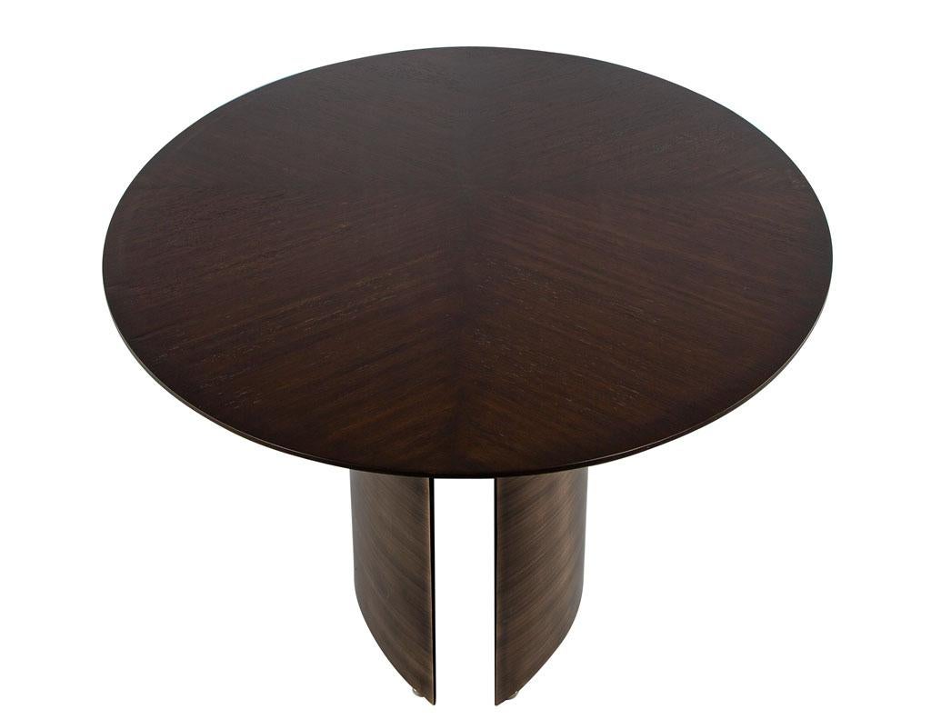 https://a.1stdibscdn.com/modern-oval-oak-dining-table-with-curved-metal-pedestals-for-sale-picture-6/f_8849/f_347313321686592221405/DS_5218_Modern_Oval_Oak_Dining_Table_Curved_Metal_Pedestals_006_master.jpg
