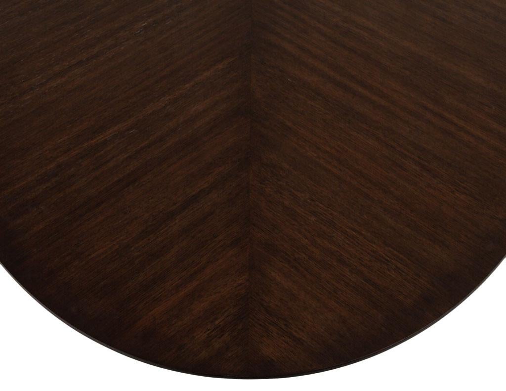 https://a.1stdibscdn.com/modern-oval-oak-dining-table-with-curved-metal-pedestals-for-sale-picture-9/f_8849/f_347313321686592221885/DS_5218_Modern_Oval_Oak_Dining_Table_Curved_Metal_Pedestals_009_master.jpg
