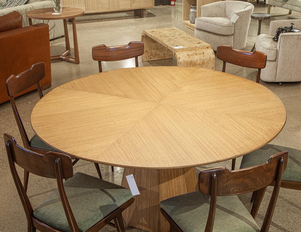 https://a.1stdibscdn.com/modern-round-oak-dining-table-for-sale-picture-11/f_8849/f_387286121709744827123/DS_5231_Modern_Round_Oak_Dining_Table_0012_master.jpg