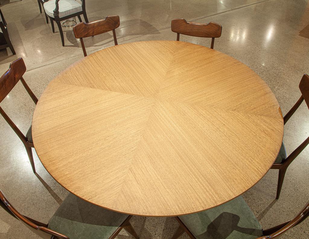 https://a.1stdibscdn.com/modern-round-oak-dining-table-for-sale-picture-13/f_8849/f_387286121709744852969/DS_5231_Modern_Round_Oak_Dining_Table_0013_master.jpg