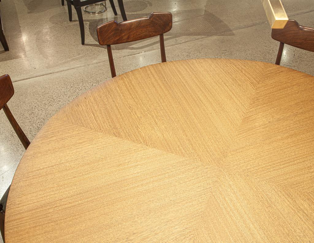 https://a.1stdibscdn.com/modern-round-oak-dining-table-for-sale-picture-12/f_8849/f_387286121709744827230/DS_5231_Modern_Round_Oak_Dining_Table_0014_master.jpg