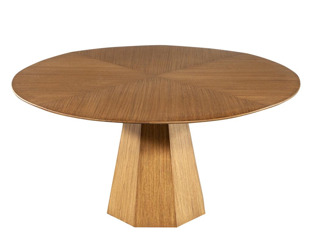 https://a.1stdibscdn.com/modern-round-oak-dining-table-for-sale-picture-2/f_8849/f_387286121709744826448/DS_5231_Modern_Round_Oak_Dining_Table_002_master.jpg