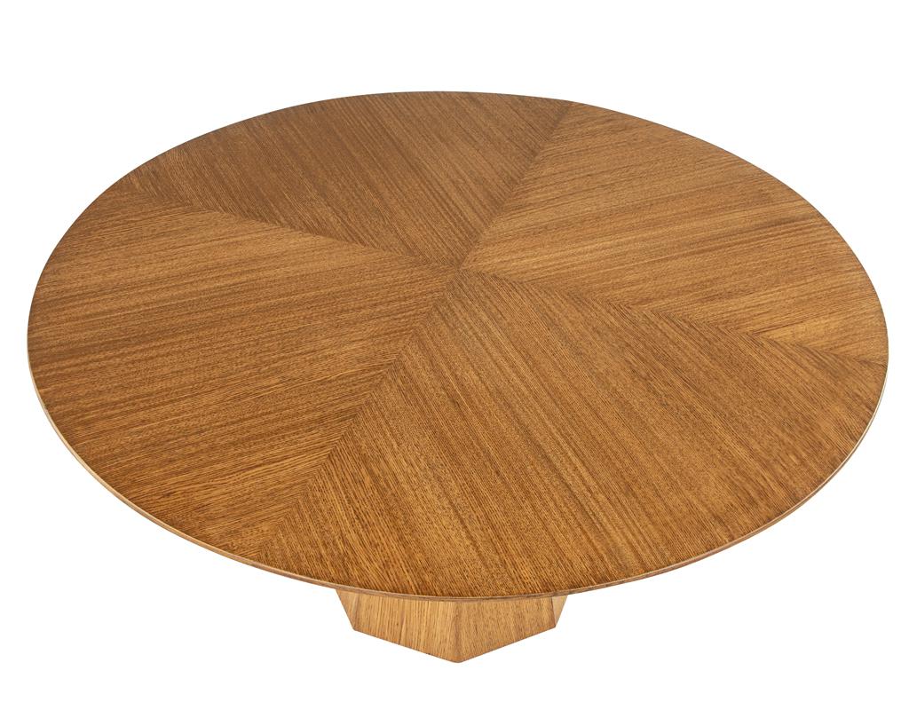 https://a.1stdibscdn.com/modern-round-oak-dining-table-for-sale-picture-3/f_8849/f_387286121709744826492/DS_5231_Modern_Round_Oak_Dining_Table_003_master.jpg