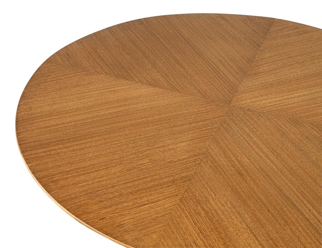 https://a.1stdibscdn.com/modern-round-oak-dining-table-for-sale-picture-4/f_8849/f_387286121709744826495/DS_5231_Modern_Round_Oak_Dining_Table_004_master.jpg