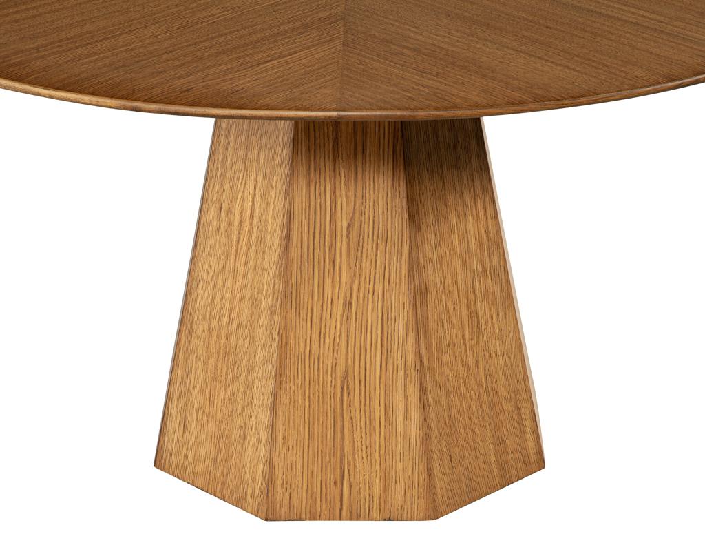 https://a.1stdibscdn.com/modern-round-oak-dining-table-for-sale-picture-5/f_8849/f_387286121709744826451/DS_5231_Modern_Round_Oak_Dining_Table_005_master.jpg