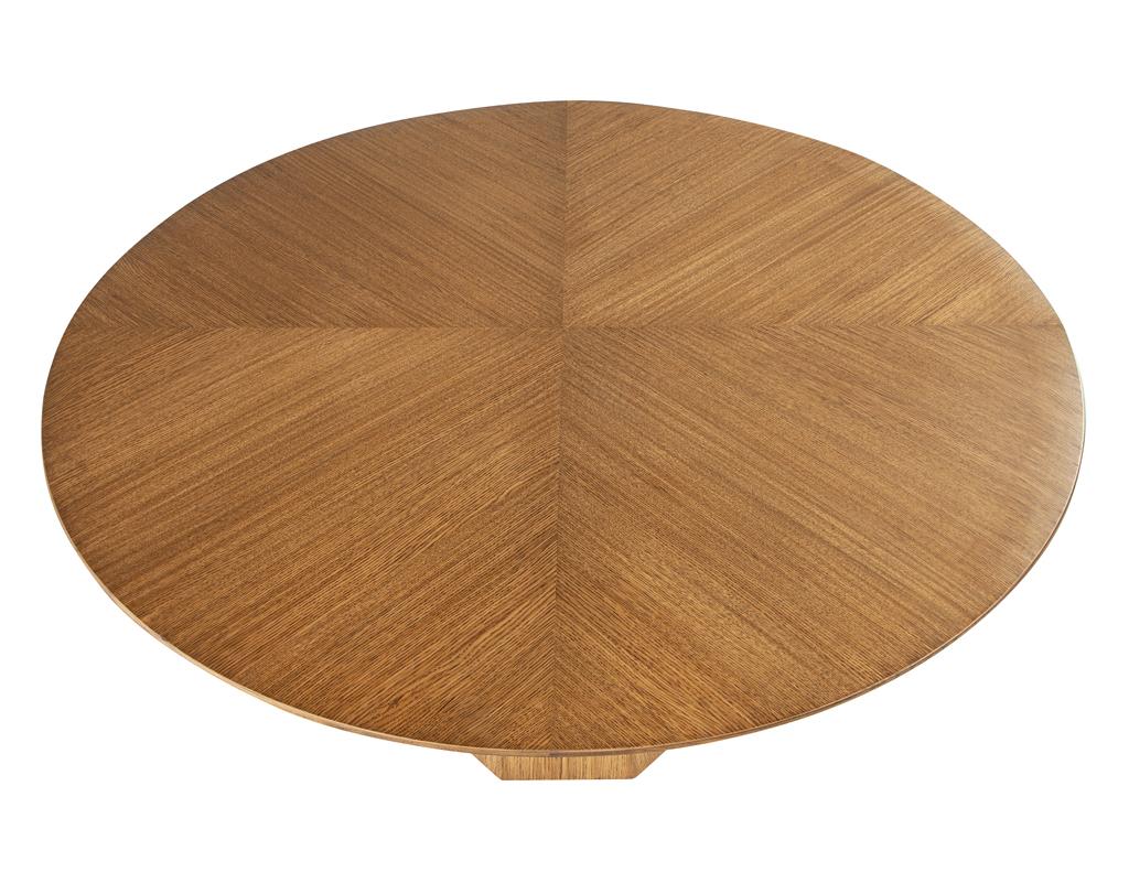 https://a.1stdibscdn.com/modern-round-oak-dining-table-for-sale-picture-6/f_8849/f_387286121709744826456/DS_5231_Modern_Round_Oak_Dining_Table_006_master.jpg