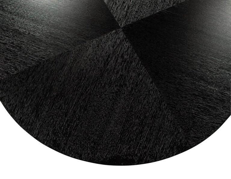 https://a.1stdibscdn.com/modern-round-dining-table-in-black-cerused-oak-finish-for-sale-picture-11/f_8849/f_387354221709761397101/DS_5233_Modern_Round_Black_Oak_Dining_Table_0011_master.jpg?width=768