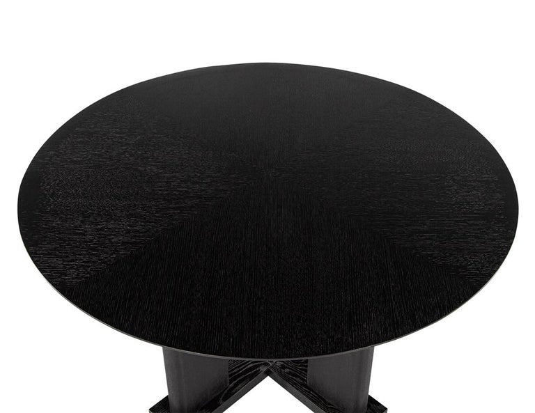 https://a.1stdibscdn.com/modern-round-dining-table-in-black-cerused-oak-finish-for-sale-picture-4/f_8849/f_387354221709761396536/DS_5233_Modern_Round_Black_Oak_Dining_Table_004_master.jpg?width=768
