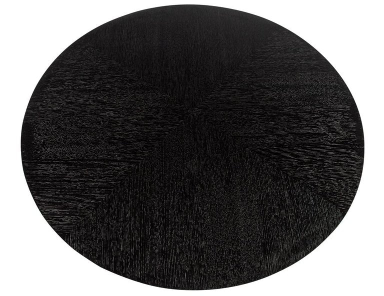 https://a.1stdibscdn.com/modern-round-dining-table-in-black-cerused-oak-finish-for-sale-picture-9/f_8849/f_387354221709761397104/DS_5233_Modern_Round_Black_Oak_Dining_Table_009_master.jpg?width=768