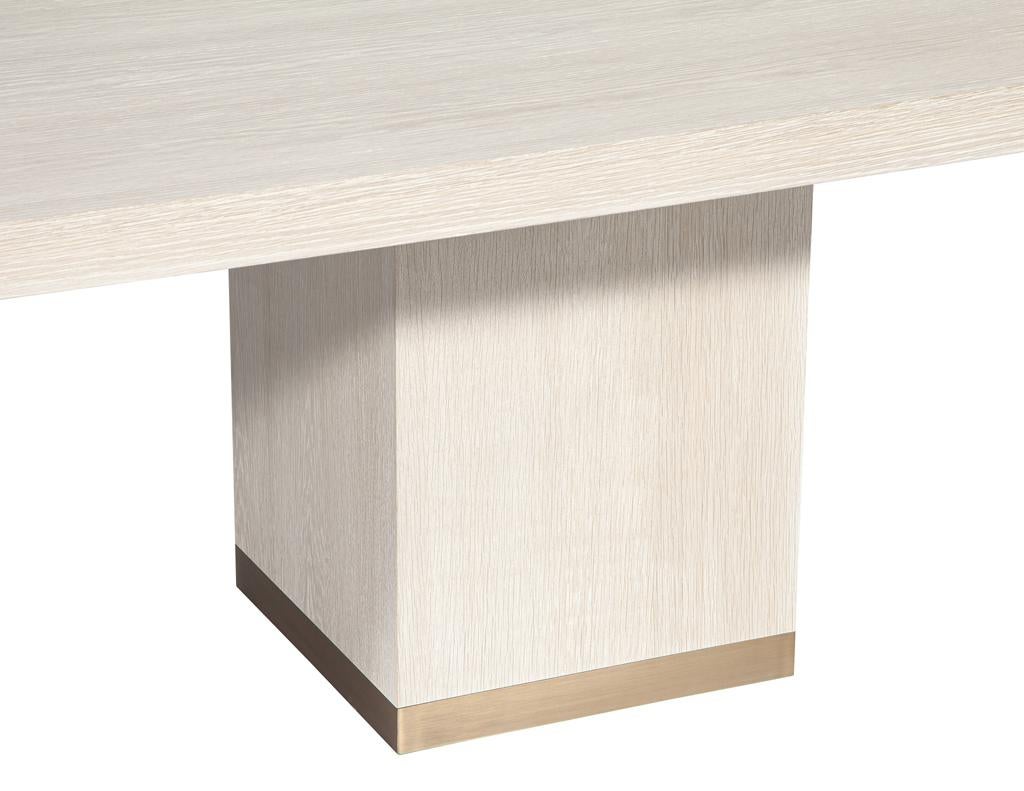 https://a.1stdibscdn.com/custom-modern-oak-dining-table-in-bleached-finish-and-brass-accents-for-sale-picture-10/f_8849/f_423292821731696357201/DS_5244_Carrocel_Custom_Modern_Oak_Dining_Table_Bleached_Finish_0010_master.jpg