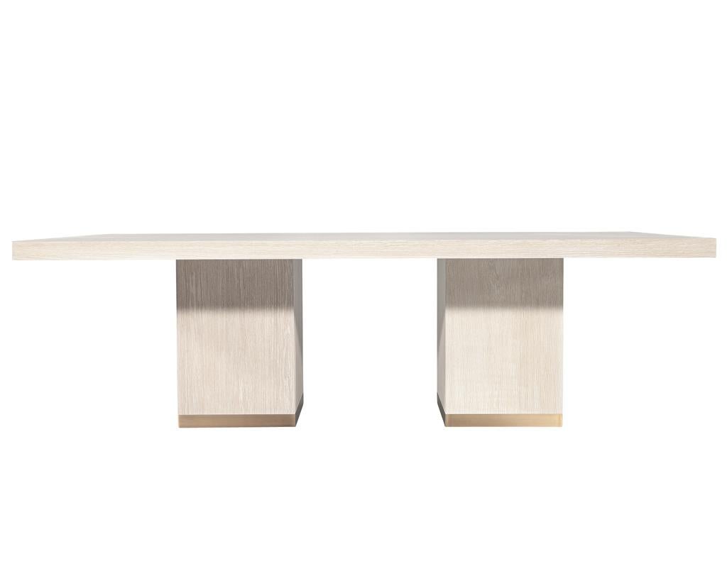https://a.1stdibscdn.com/custom-modern-oak-dining-table-in-bleached-finish-and-brass-accents-for-sale-picture-3/f_8849/f_423292821731696356611/DS_5244_Carrocel_Custom_Modern_Oak_Dining_Table_Bleached_Finish_003_master.jpg