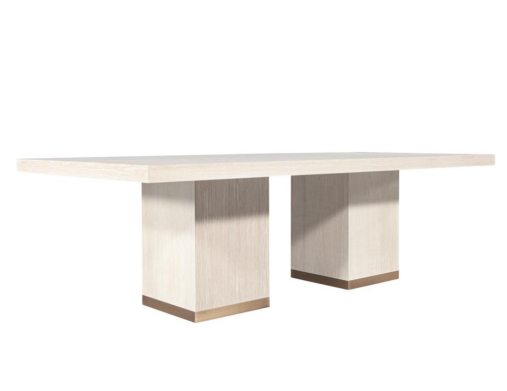 https://a.1stdibscdn.com/custom-modern-oak-dining-table-in-bleached-finish-and-brass-accents-for-sale-picture-4/f_8849/f_423292821731696356633/DS_5244_Carrocel_Custom_Modern_Oak_Dining_Table_Bleached_Finish_004_master.jpg