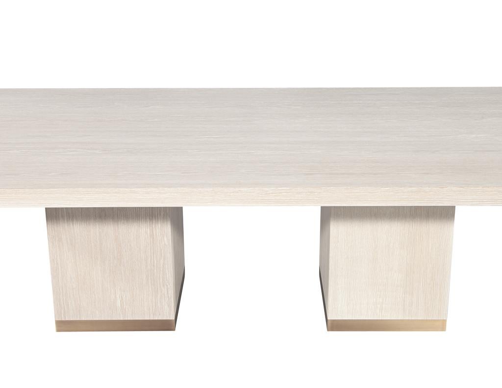 https://a.1stdibscdn.com/custom-modern-oak-dining-table-in-bleached-finish-and-brass-accents-for-sale-picture-5/f_8849/f_423292821731696356642/DS_5244_Carrocel_Custom_Modern_Oak_Dining_Table_Bleached_Finish_005_master.jpg