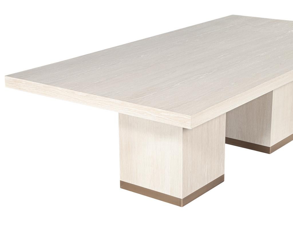 https://a.1stdibscdn.com/custom-modern-oak-dining-table-in-bleached-finish-and-brass-accents-for-sale-picture-6/f_8849/f_423292821731696356632/DS_5244_Carrocel_Custom_Modern_Oak_Dining_Table_Bleached_Finish_006_master.jpg
