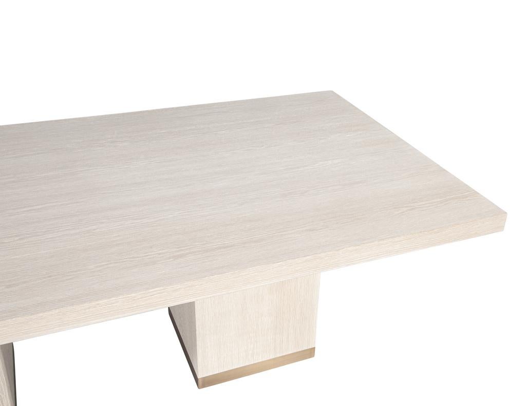 https://a.1stdibscdn.com/custom-modern-oak-dining-table-in-bleached-finish-and-brass-accents-for-sale-picture-8/f_8849/f_423292821731696357211/DS_5244_Carrocel_Custom_Modern_Oak_Dining_Table_Bleached_Finish_008_master.jpg