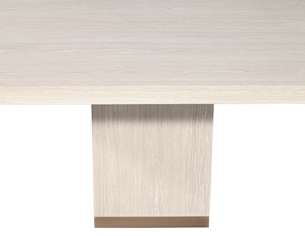 https://a.1stdibscdn.com/custom-modern-oak-dining-table-in-bleached-finish-and-brass-accents-for-sale-picture-9/f_8849/f_423292821731696357219/DS_5244_Carrocel_Custom_Modern_Oak_Dining_Table_Bleached_Finish_009_master.jpg