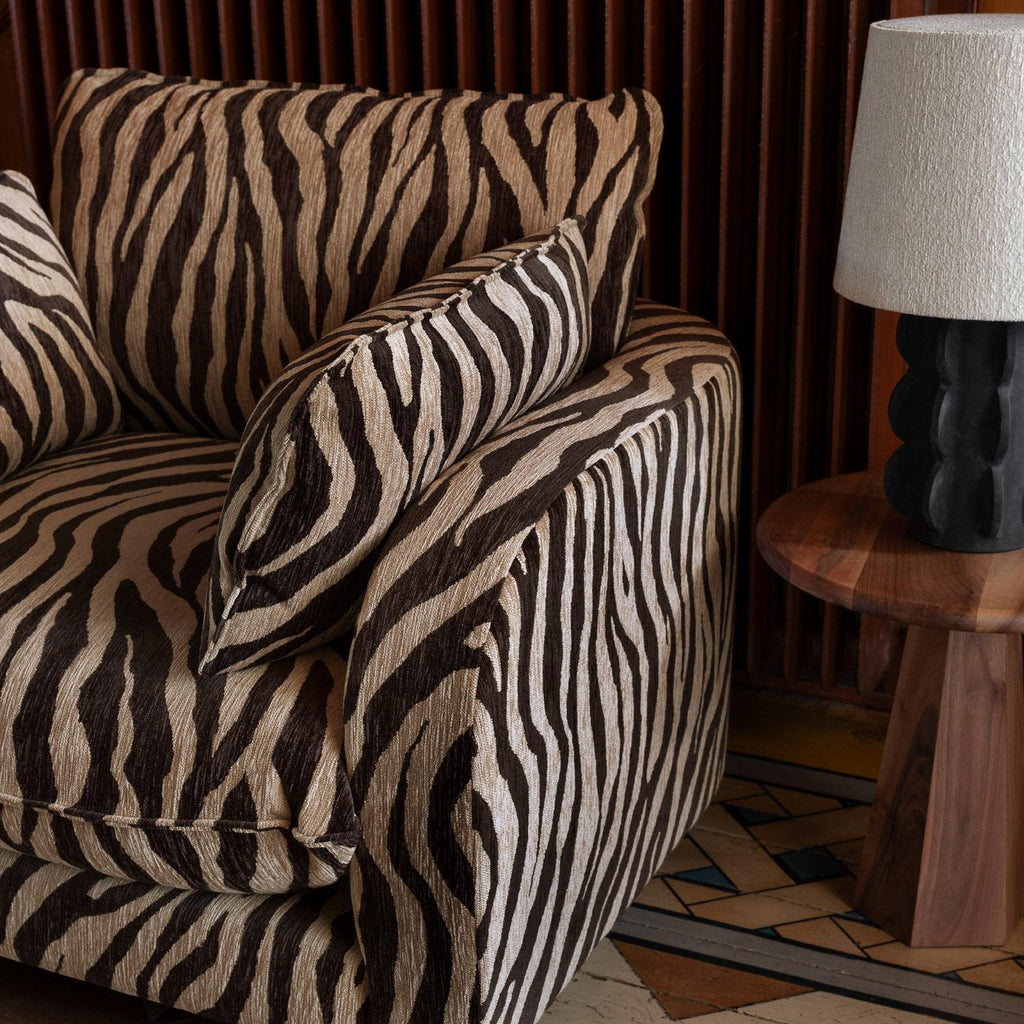 https://a.1stdibscdn.com/zebra-patterned-upholstered-armchair-model-miles-for-sale-picture-7/f_58912/f_488333421771257323855/DUSTY_DECO37647_master.jpg