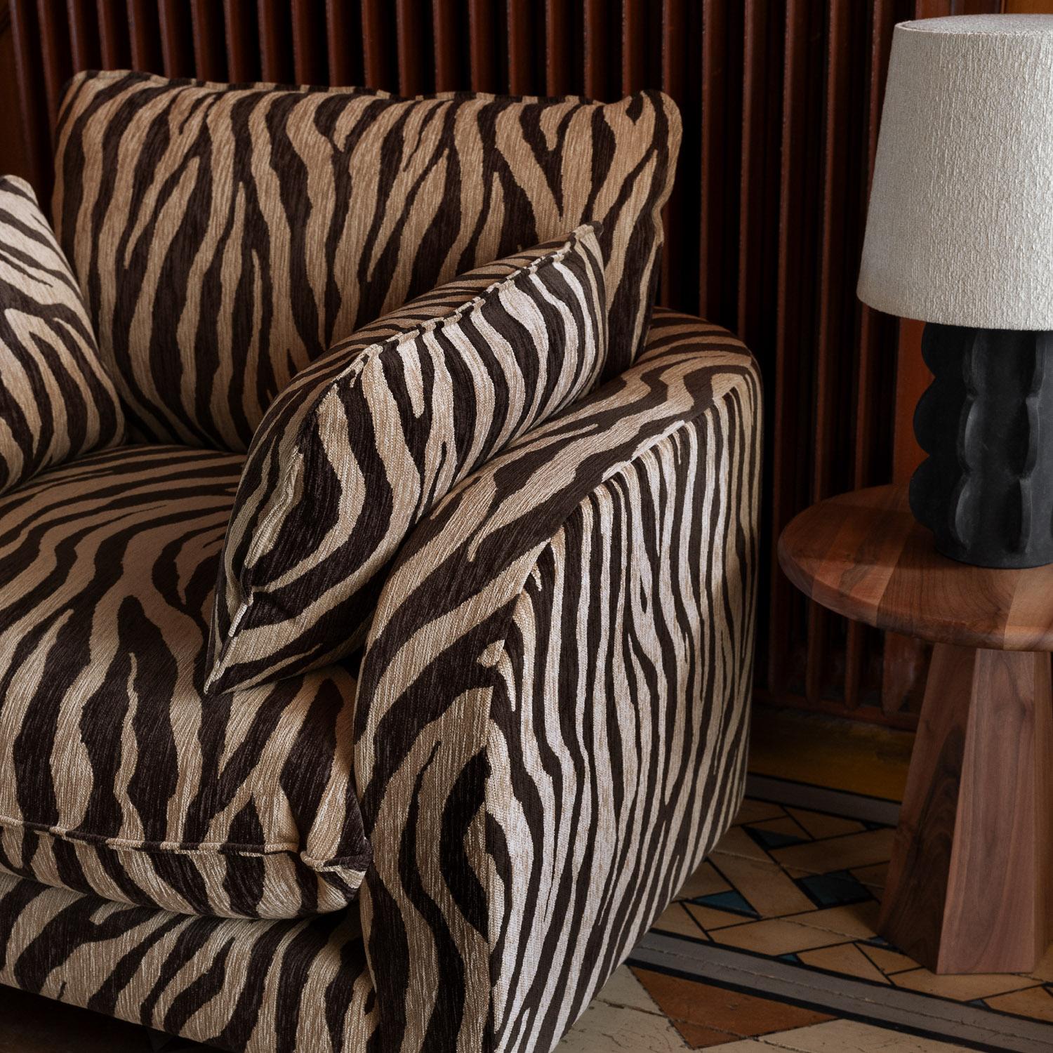 https://a.1stdibscdn.com/zebra-patterned-upholstered-armchair-model-miles-for-sale-picture-7/f_58912/f_488333421771257323855/DUSTY_DECO37647_master.jpg