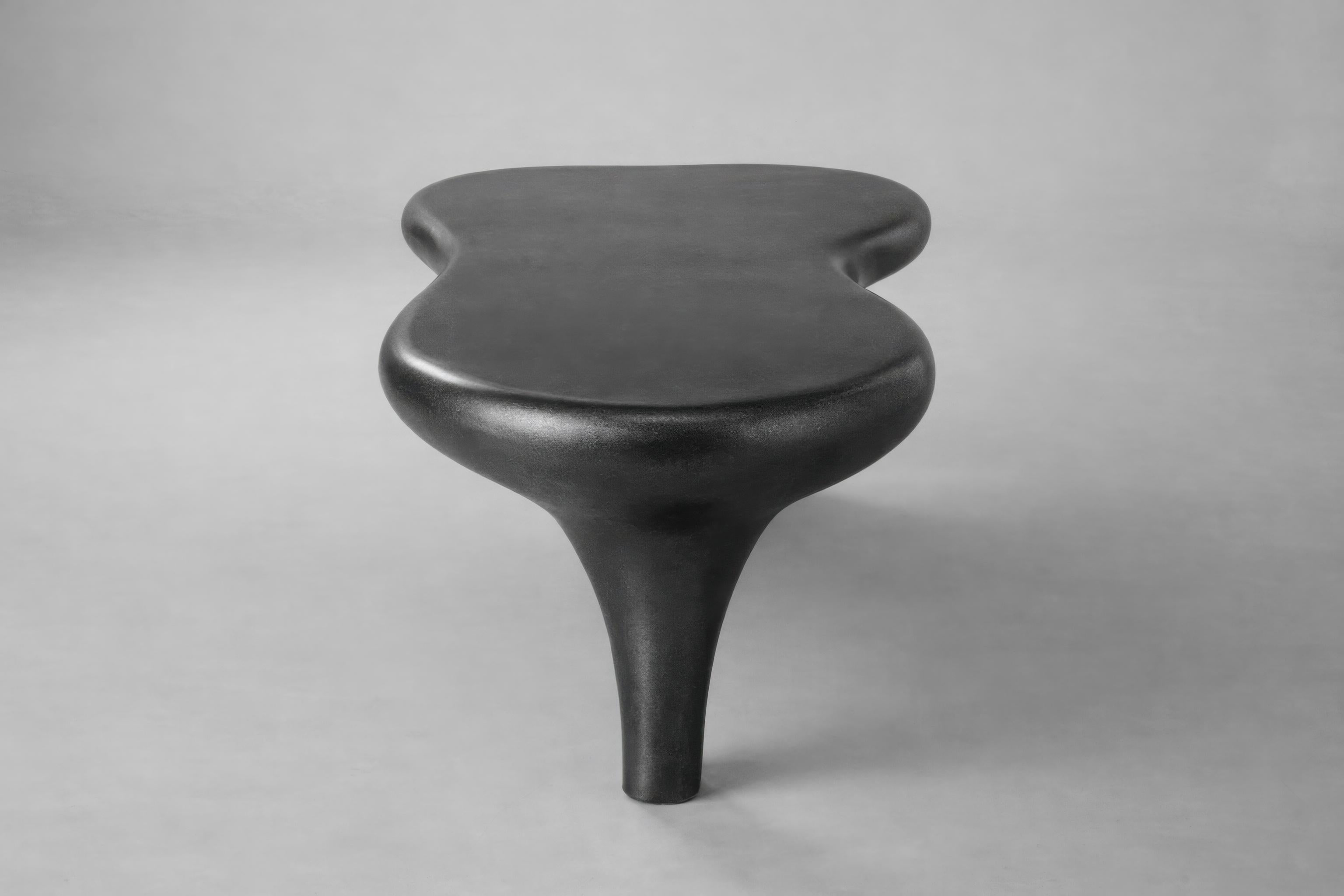 https://a.1stdibscdn.com/golem-sculptural-amorphous-coffee-table-in-satin-liquid-graphite-for-sale-picture-3/f_27693/f_489683721771996052229/DW_ChatGPT_Image_Feb_24_2026_08_24_51_PM_gigapixel_standard_v2_2x_master.jpeg
