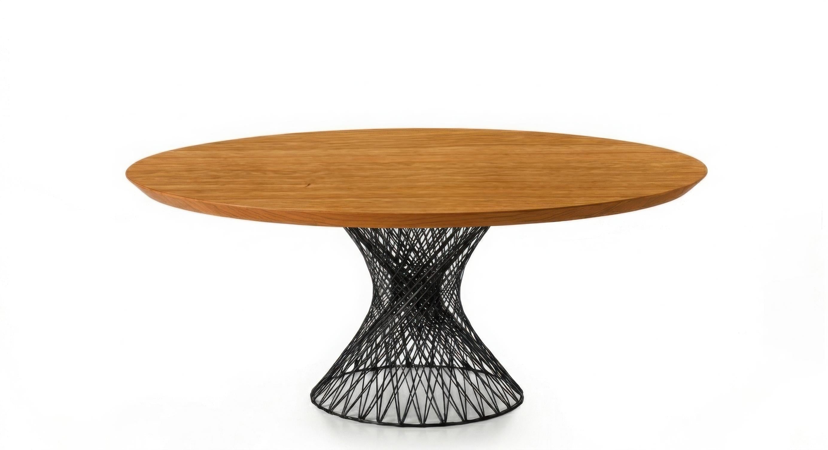 https://a.1stdibscdn.com/mid-century-modern-style-cherry-wood-top-dining-table-with-carbon-fiber-base-for-sale/f_27693/f_495710321775620837964/DW_Gemini_Generated_Image_9_gigapixel_standard_v2_2x_master.jpeg