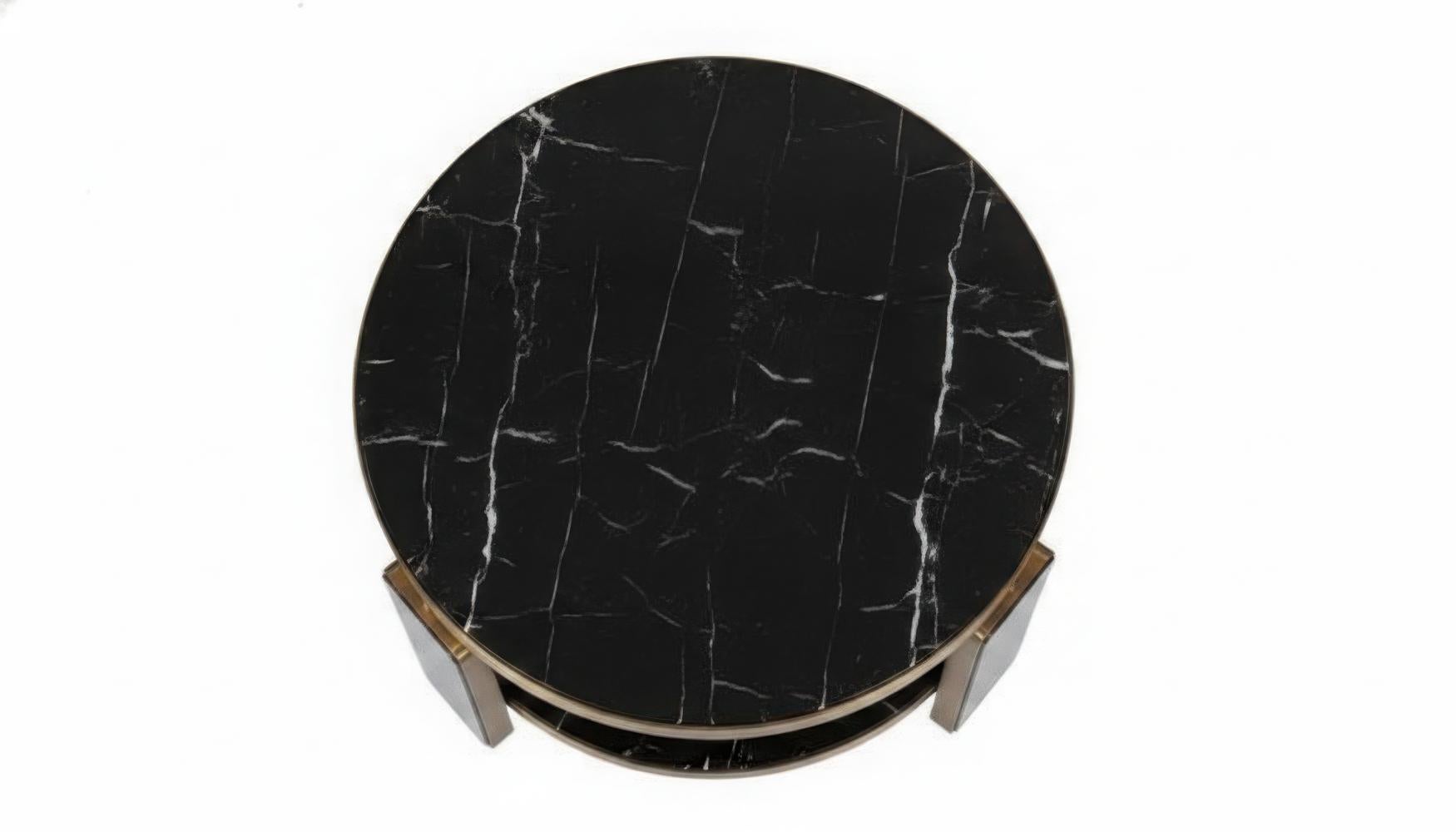 https://a.1stdibscdn.com/hollywood-regency-round-coffee-table-in-brass-and-marble-by-jose-de-castro-for-sale-picture-3/f_27693/f_472538521777411345833/DW_Whisk_397a23659c01c75ae944d20a6bdca3c2dr_gigapixel_standard_v2_1000h_master.jpeg