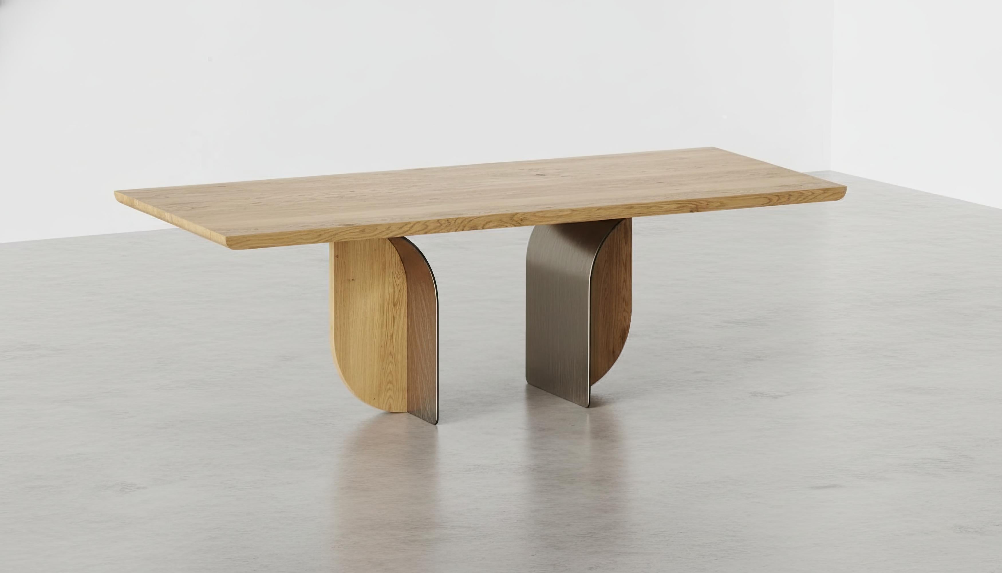 https://a.1stdibscdn.com/solid-oak-dining-table-w-custom-lacquered-iron-base-by-carlesi-tonelli-studio-for-sale-picture-3/f_27693/f_466802721776203760733/DW_Whisk_b0b90d250b4bd3f8df74f933b07e4f68dr_gigapixel_cgi_2000h_master.jpeg