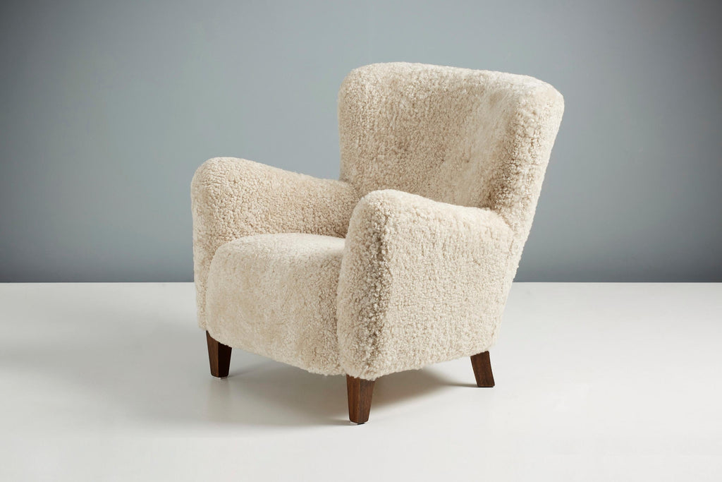 https://a.1stdibscdn.com/custom-made-ryo-sheepskin-lounge-chair-for-sale-picture-2/f_67442/f_289408121654196673263/DagmarDesign_DD_004HHLowChair_Moonlight_Fumed_Oak_08_copy_master.jpg