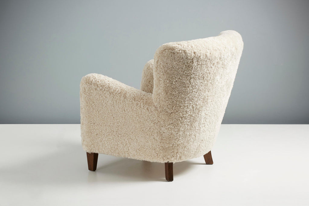 https://a.1stdibscdn.com/custom-made-ryo-sheepskin-lounge-chair-for-sale-picture-7/f_67442/f_289408121654196673906/DagmarDesign_DD_004HHLowChair_Moonlight_Fumed_Oak_21_copy_master.jpg