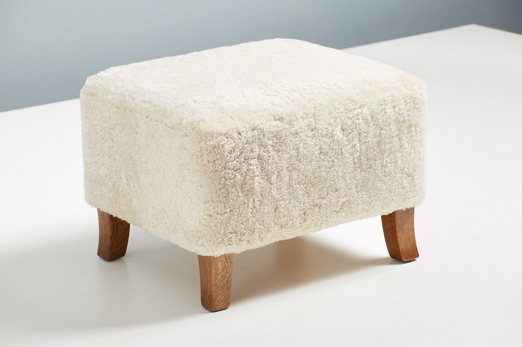 https://a.1stdibscdn.com/sheepskin-sampo-chair-ottoman-for-sale-picture-3/f_13332/f_362756921695397167623/DagmarDesign_SampoChair_Ottoman_Moonlight_19_master.jpg
