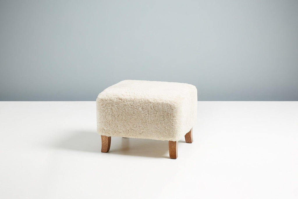 https://a.1stdibscdn.com/sheepskin-sampo-chair-ottoman-for-sale-picture-4/f_13332/f_362756921695397167123/DagmarDesign_SampoChair_Ottoman_Moonlight_22_master.jpg