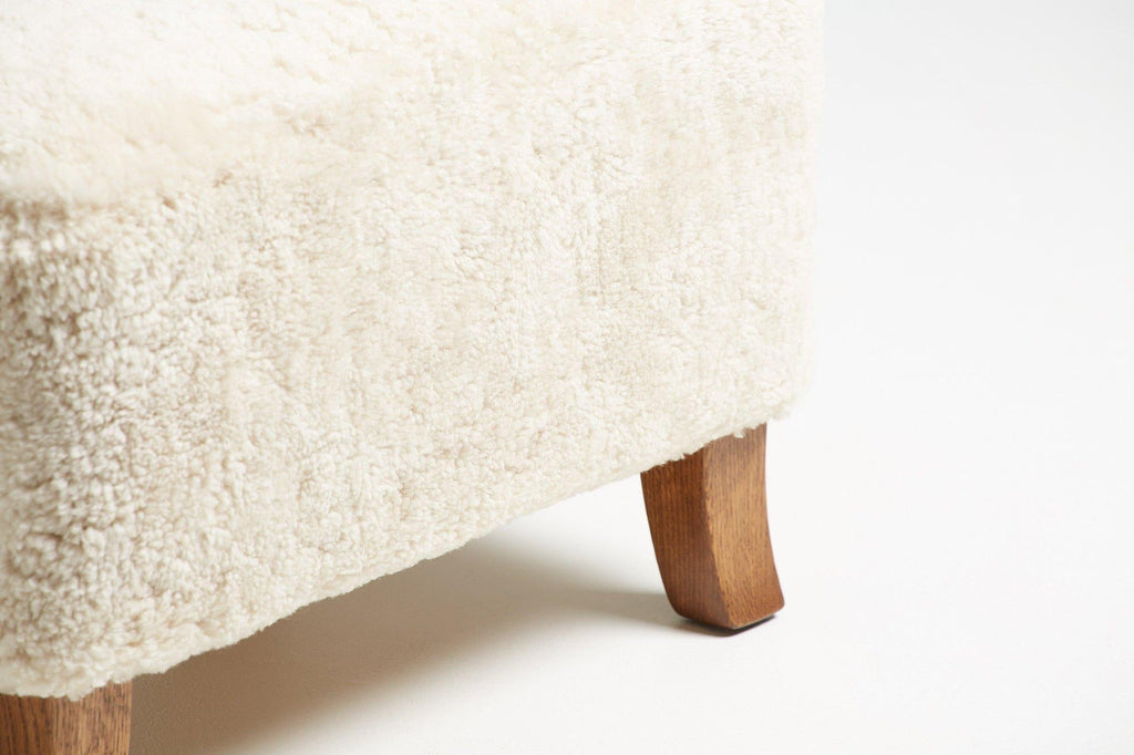 https://a.1stdibscdn.com/sheepskin-sampo-chair-ottoman-for-sale-picture-5/f_13332/f_362756921695397167739/DagmarDesign_SampoChair_Ottoman_Moonlight_24_master.jpg