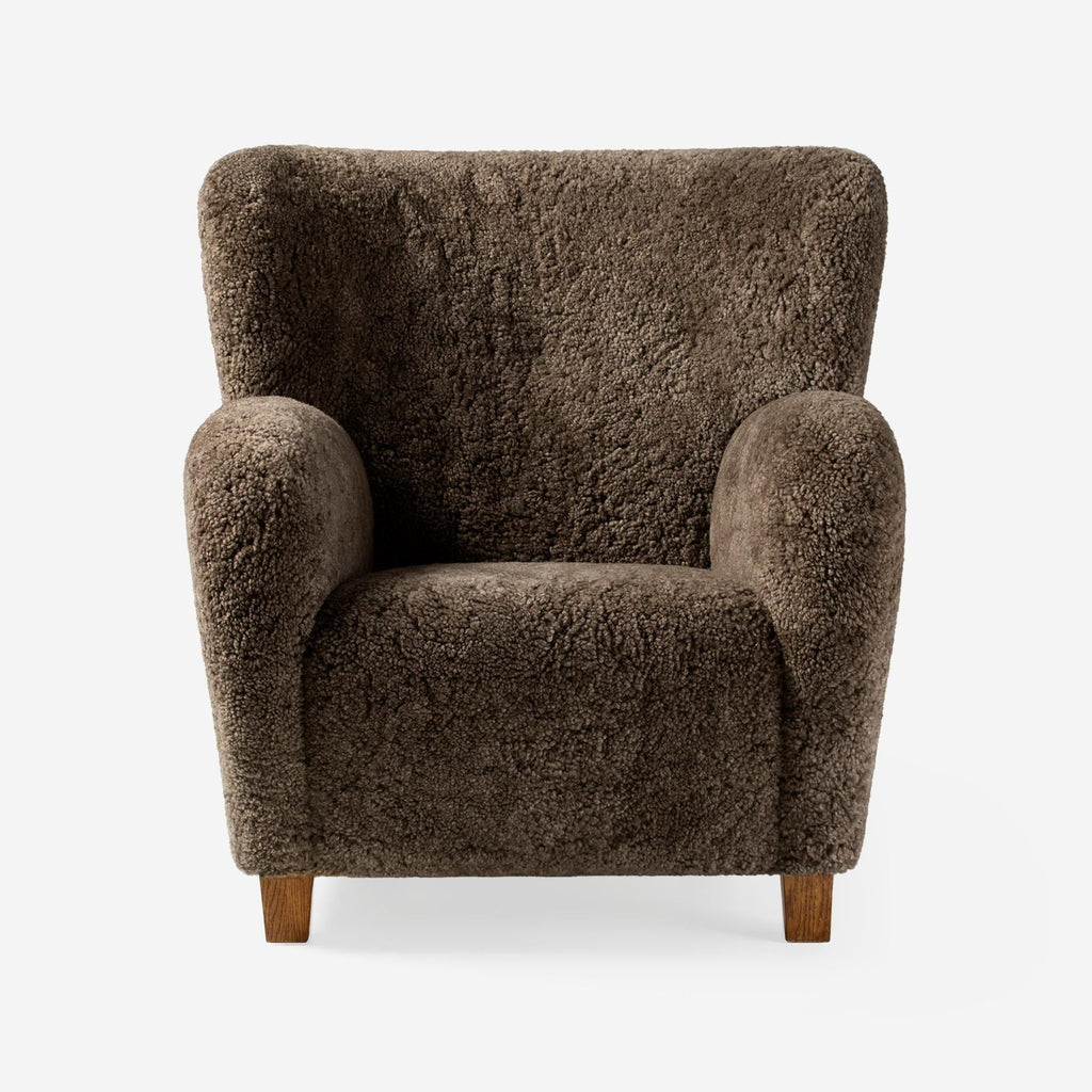 https://a.1stdibscdn.com/pair-of-custom-made-sheepskin-karu-lounge-chairs-for-sale-picture-6/f_67442/f_289369121738077999284/Dagmar_Karu_Chair_SK_Sahara_Fumed_Oak_Front_1__master.jpg