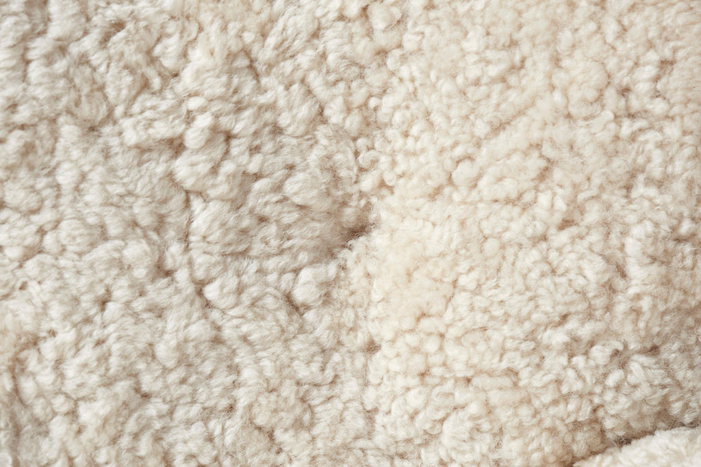 https://a.1stdibscdn.com/custom-made-sheepskin-karu-sofa-by-dagmar-for-sale-picture-4/f_13332/f_431187721736615653847/Dagmar_Karu_Sofa_155W_SK_Moonlight_Detail_2_master.jpg