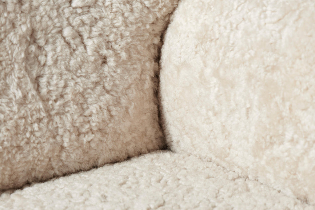https://a.1stdibscdn.com/custom-made-sheepskin-karu-sofa-by-dagmar-for-sale-picture-6/f_13332/f_431187721736615653601/Dagmar_Karu_Sofa_155W_SK_Moonlight_Detail_master.jpg