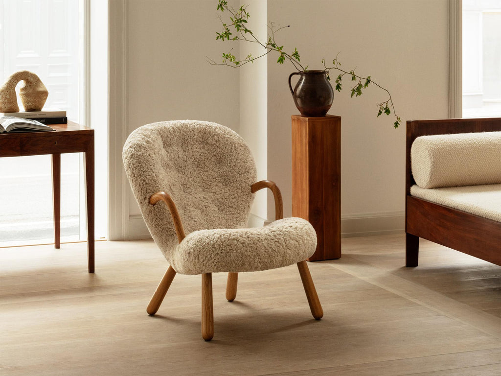 https://a.1stdibscdn.com/arnold-madsen-sheepskin-clam-chair-stool-for-sale-picture-6/f_13332/f_413826121725795215874/Dagmar_LS_Clam_Chair_Moonlight_Oiled_Oak_7_master.jpg