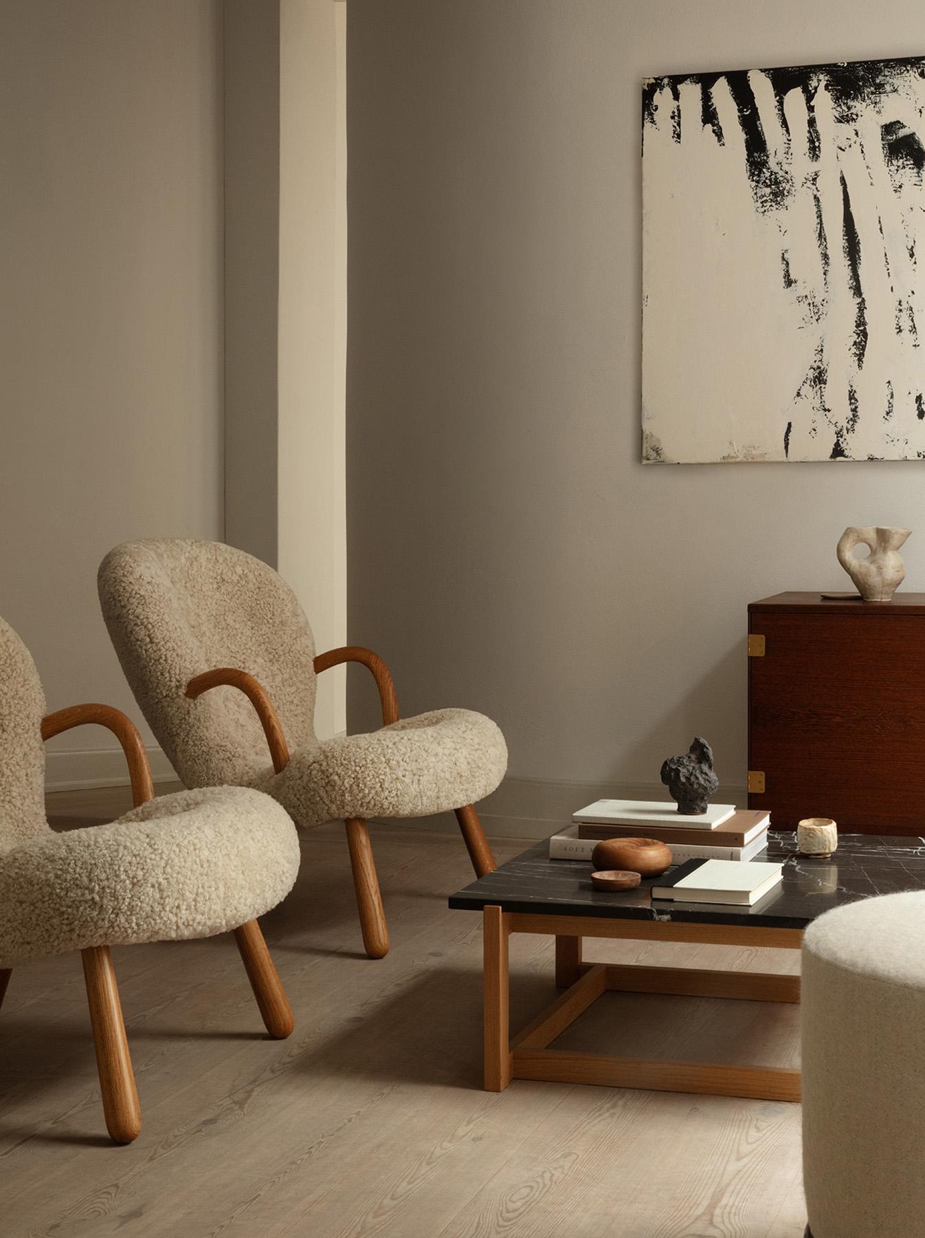 https://a.1stdibscdn.com/arnold-madsen-sheepskin-clam-chair-new-edition-for-sale-picture-5/f_13332/f_406689721721213728392/Dagmar_LS_Clam_Chair_Moonlight_Oiled_Oak_Pair_master.jpg