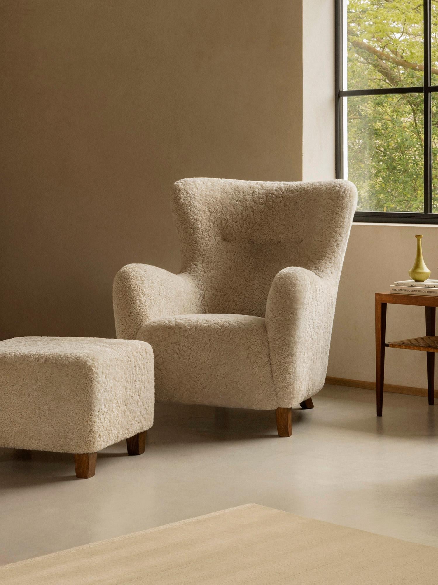 https://a.1stdibscdn.com/custom-made-sampo-sheepskin-wing-chair-for-sale-picture-3/f_67442/f_306415521730978821075/Dagmar_LS_Sampo_Chair_Stool_Moonlight_master.jpg