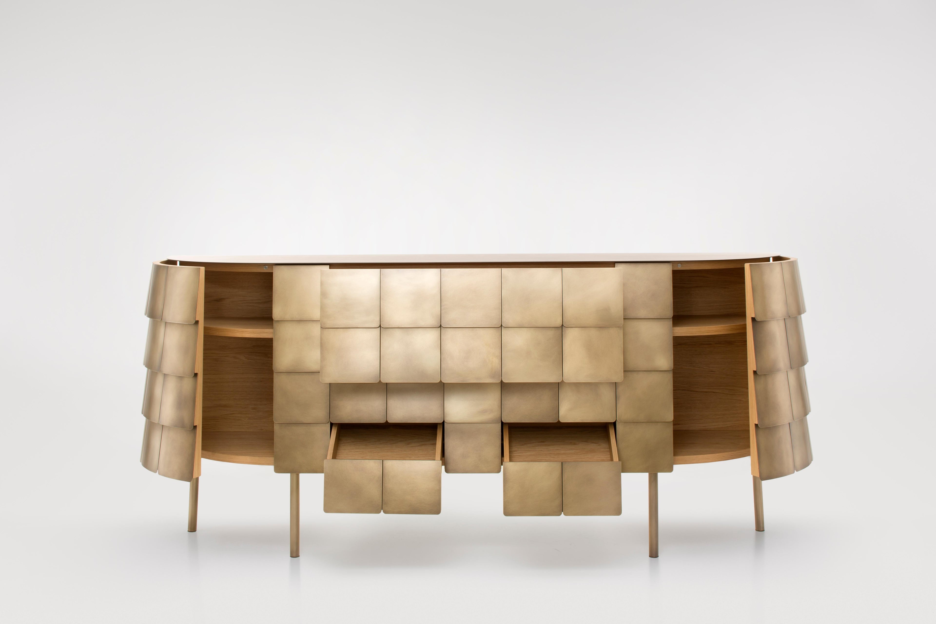 https://a.1stdibscdn.com/decastelli-yoroi-cabinet-in-stainless-steel-by-alesandro-masturzo-for-sale-picture-2/22569652/f_228540021615268455294/De_Castelli_Yoroi_Design_Alesandro_Masturzo_PH_Alberto_Parise_2_master.jpg