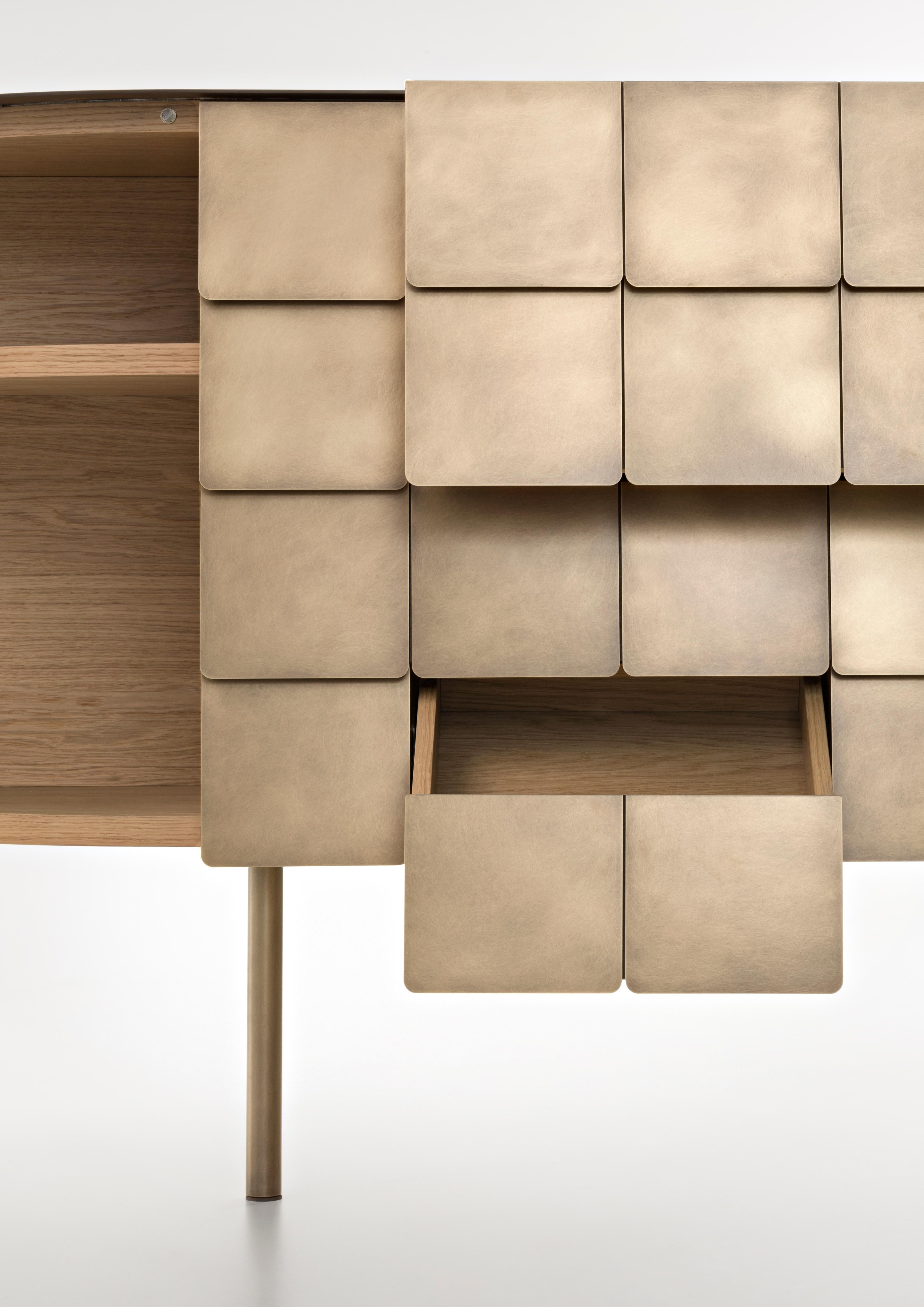 https://a.1stdibscdn.com/decastelli-yoroi-cabinet-in-stainless-steel-by-alesandro-masturzo-for-sale-picture-4/22569652/f_228540021615268472329/De_Castelli_Yoroi_Design_Alesandro_Masturzo_PH_Alberto_Parise_4_master.jpg