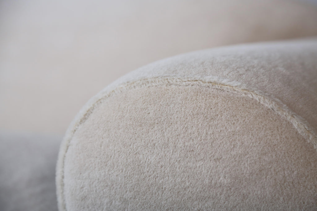https://a.1stdibscdn.com/elegant-sofa-upholstered-in-pure-alpaca-for-sale-picture-6/f_22593/f_415100221726587234526/Deco_Sofa_Ivory_Alpaca_4_23_4_master.jpg