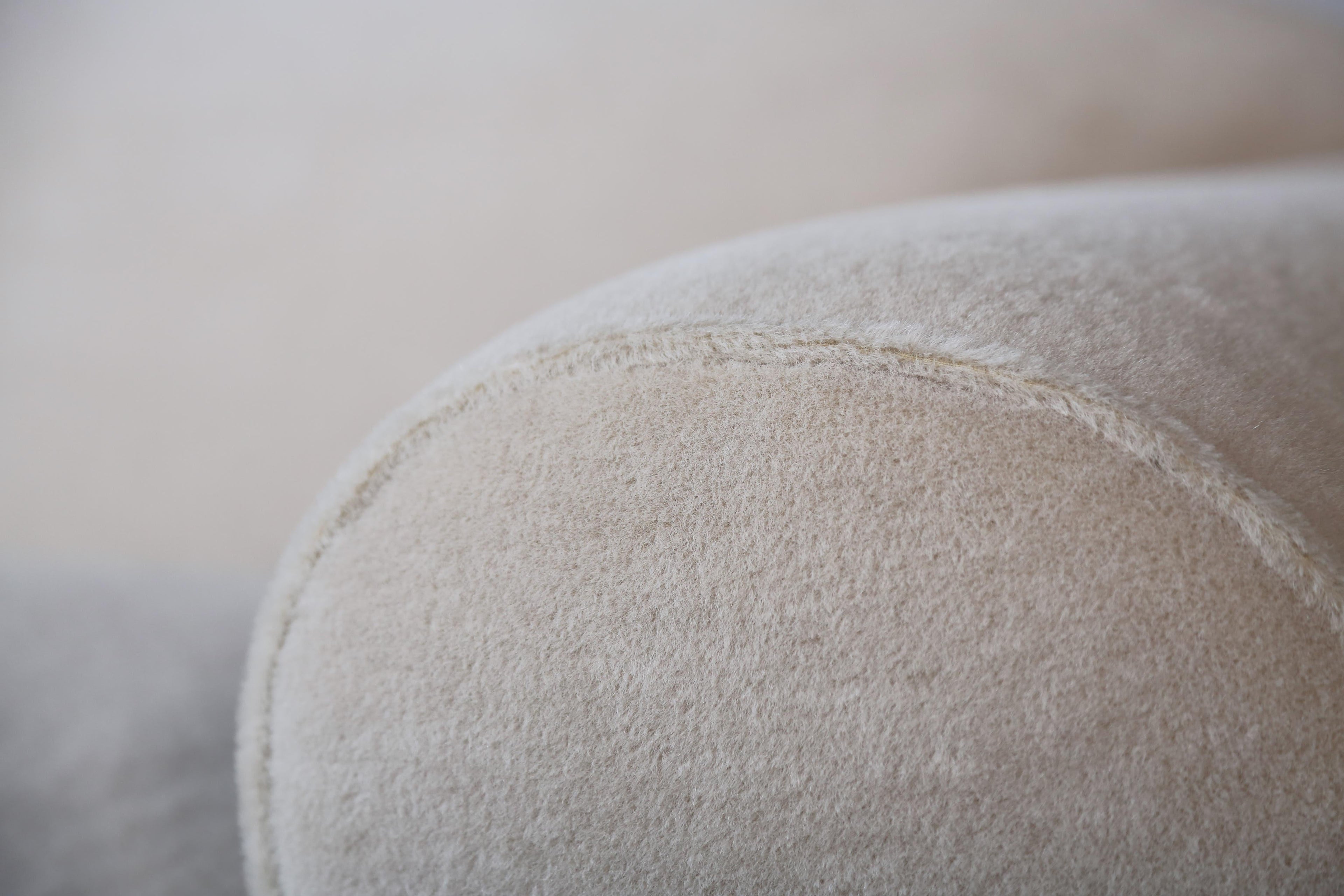 https://a.1stdibscdn.com/elegant-sofa-upholstered-in-pure-alpaca-for-sale-picture-6/f_22593/f_415100221726587234526/Deco_Sofa_Ivory_Alpaca_4_23_4_master.jpg