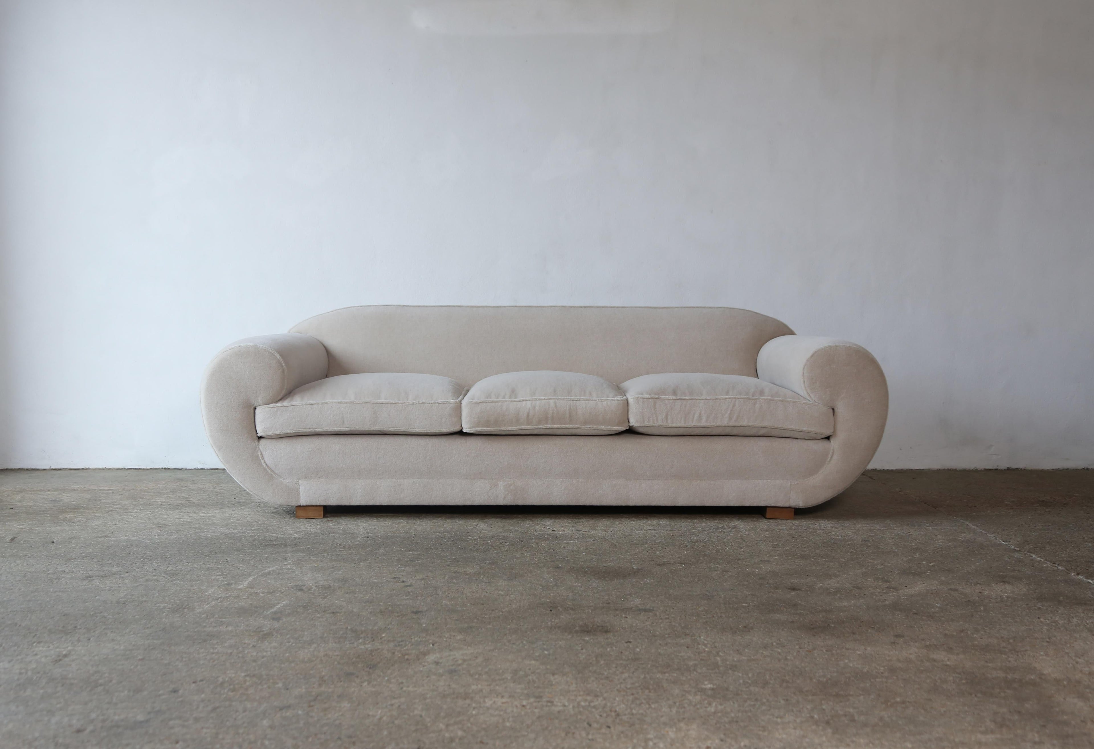 https://a.1stdibscdn.com/elegant-sofa-upholstered-in-pure-alpaca-for-sale-picture-2/f_22593/f_415100221726587230838/Deco_Sofa_Ivory_Alpaca_4_23_master.jpg
